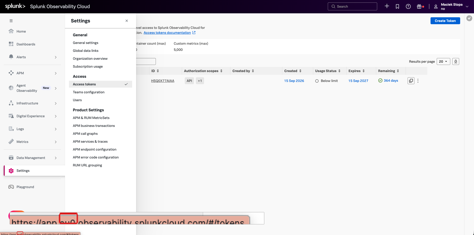 Access Tokens page under Settings in Splunk Observability Cloud; the org URL app.eu0.observability.splunkcloud.com is magnified with the realm eu0 highlighted in red